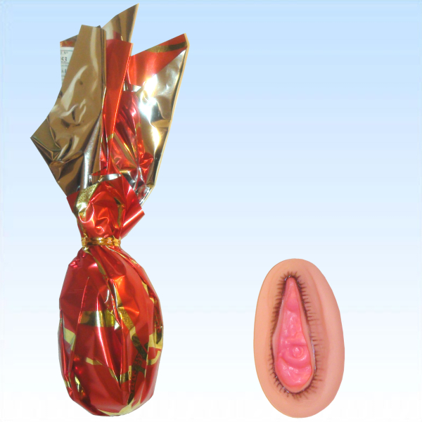 Muschi in Geschenkpapier